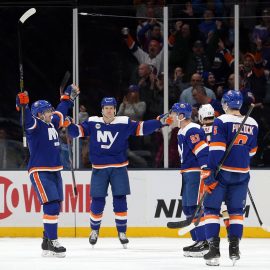 Jan 20, 2019; Uniondale, NY, USA; New York Islanders right wing Cal Clutterbuck (15) celebrates the second of his two first period goals against the Anaheim Ducks with teammates during the first period at Nassau Veterans Memorial Coliseum. Mandatory Credit: Brad Penner-USA TODAY Sports