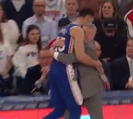 Ben Simmons hugs Brett Brown