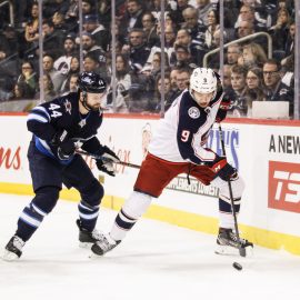 Jan 31, 2019; Winnipeg, Manitoba, CAN; Columbus Blue Jackets forward Artemi Panarin (9) skates away fromWinnipeg Jets defenseman Josh Morrissey (44) during the first period at Bell MTS Place. Mandatory Credit: Terrence Lee-USA TODAY Sports