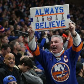 Feb 1, 2019; Uniondale, NY, USA; A fan of the New York Islanders displays a sign during the third period against the Tampa Bay Lightning at Nassau Veterans Memorial Coliseum. Mandatory Credit: Brad Penner-USA TODAY Sports