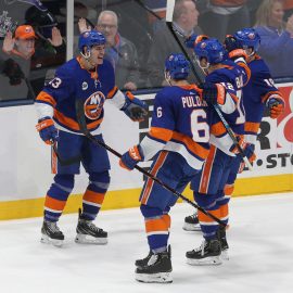 Feb 2, 2019; Uniondale, NY, USA; New York Islanders center Mathew Barzal (13) celebrates his game tying goal against the Los Angeles Kings with teammates during the third period at Nassau Veterans Memorial Coliseum. Mandatory Credit: Brad Penner-USA TODAY Sports