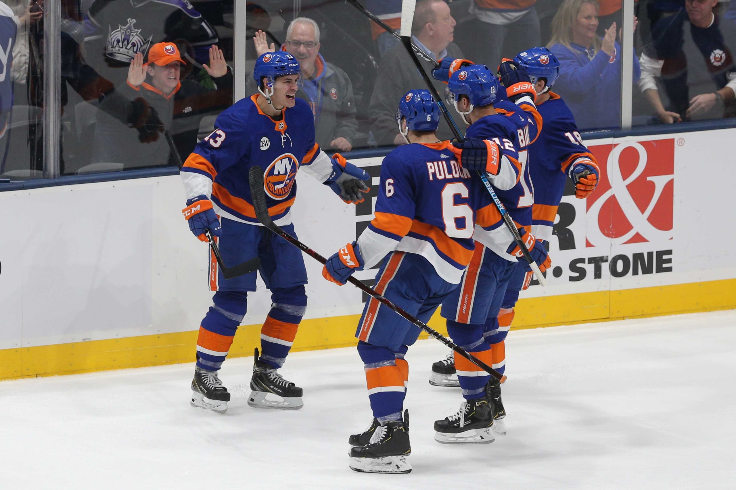 Feb 2, 2019; Uniondale, NY, USA; New York Islanders center Mathew Barzal (13) celebrates his game tying goal against the Los Angeles Kings with teammates during the third period at Nassau Veterans Memorial Coliseum. Mandatory Credit: Brad Penner-USA TODAY Sports