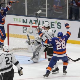 Feb 2, 2019; Uniondale, NY, USA; New York Islanders left wing Michael Dal Colle (28) reacts after scoring the game winning goal against Los Angeles Kings goalie Jonathan Quick (32) during the third period at Nassau Veterans Memorial Coliseum. Mandatory Credit: Brad Penner-USA TODAY Sports