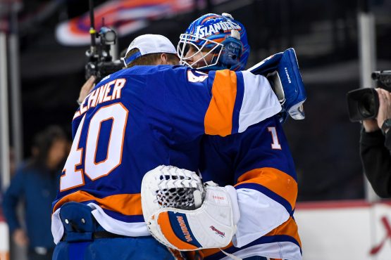 Feb 10, 2019; Brooklyn, NY, USA; New York Islanders goaltender Robin Lehner (40) celebrates with Islanders goaltender Thomas Greiss (1) after defeating the against the Minnesota Wild at Barclays Center. Mandatory Credit: Dennis Schneidler-USA TODAY Sports