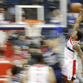 Beal dunks poster Salah Mejri