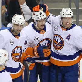 Nov 10, 2018; Sunrise, FL, USA; New York Islanders center Mathew Barzal (13) celebrates his goal against the Florida Panthers with left wing Josh Bailey (12) and defenseman Nick Leddy (2) in the first period at BB&T Center. Mandatory Credit: Robert Mayer-USA TODAY Sports