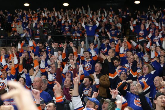 Feb 28, 2019; Brooklyn, NY, USA; New York Islanders fans celebrate a goal against the Toronto Maple Leafs during the second period at the Nassau Veterans Memorial Coliseum. Mandatory Credit: Brad Penner-USA TODAY Sports