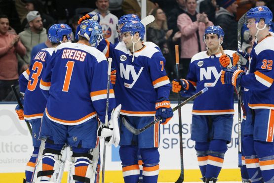 Mar 5, 2019; Uniondale, NY, USA; New York Islanders goalie Thomas Greiss (1) celebrates with teammates after defeating the Ottawa Senators in a shootout at Nassau Veterans Memorial Coliseum. Mandatory Credit: Brad Penner-USA TODAY Sports