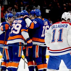 Mar 14, 2019; Uniondale, NY, USA; Montreal Canadiens right wing Brendan Gallagher (11) skates away as the New York Islanders celebrate a goal during the second period at Nassau Veterans Memorial Coliseum. Mandatory Credit: Andy Marlin-USA TODAY Sports