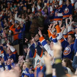 Mar 24, 2019; Uniondale, NY, USA; New York Islanders fans celebrate after an Islanders goal against the Arizona Coyotes during the third period at Nassau Veterans Memorial Coliseum. Mandatory Credit: Brad Penner-USA TODAY Sports