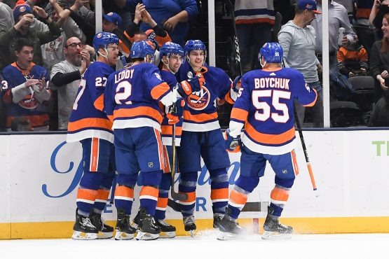 Mar 30, 2019; Uniondale, NY, USA; New York Islanders celebrate the goal by New York Islanders right wing Jordan Eberle (7) against the Buffalo Sabres during the first period at Nassau Veterans Memorial Coliseum. Mandatory Credit: Dennis Schneidler-USA TODAY Sports