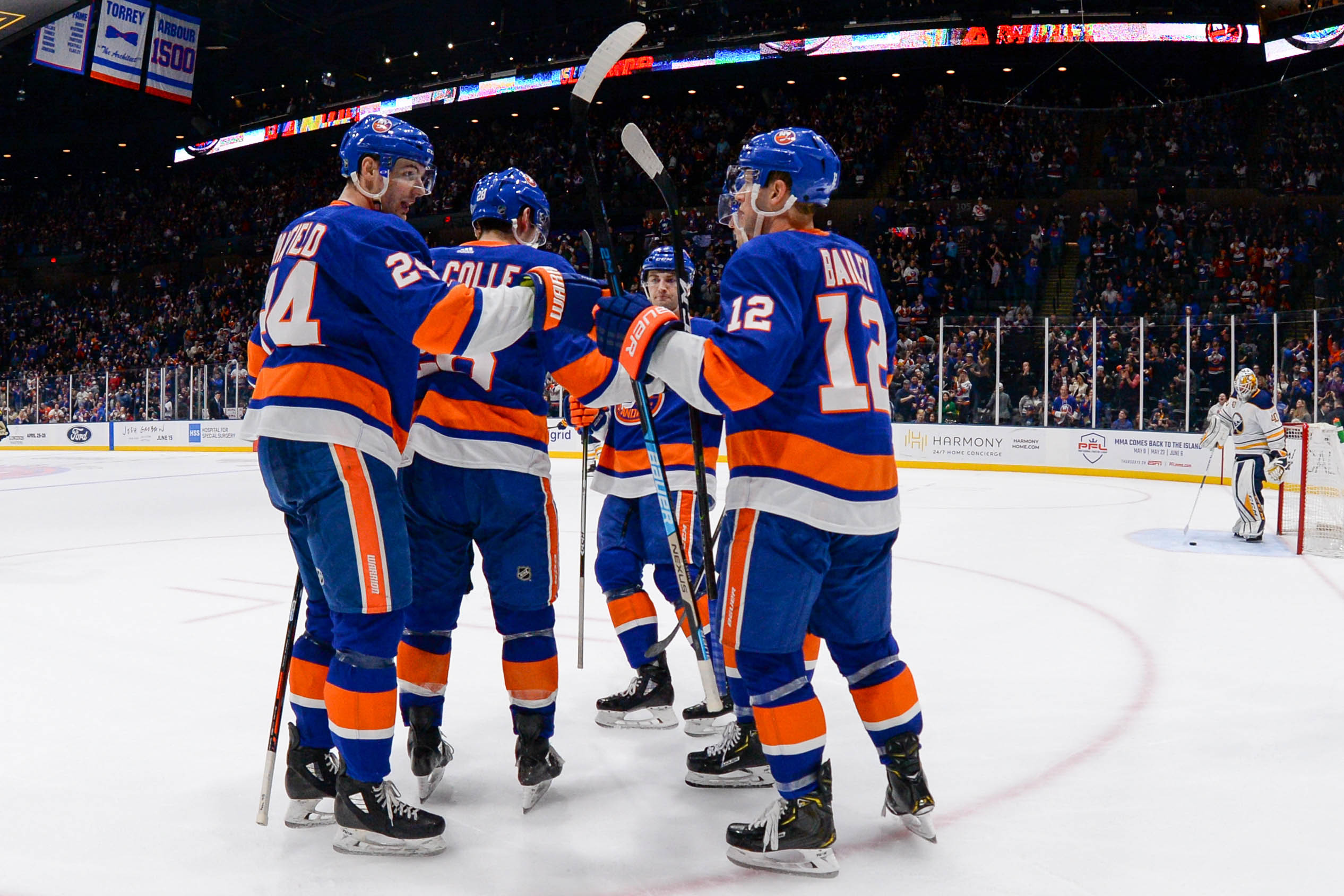 Mar 30, 2019; Uniondale, NY, USA; New York Islanders celebrate the goal by left wing Michael Dal Colle (28) against the Buffalo Sabres during the second period at Nassau Veterans Memorial Coliseum. Mandatory Credit: Dennis Schneidler-USA TODAY Sports