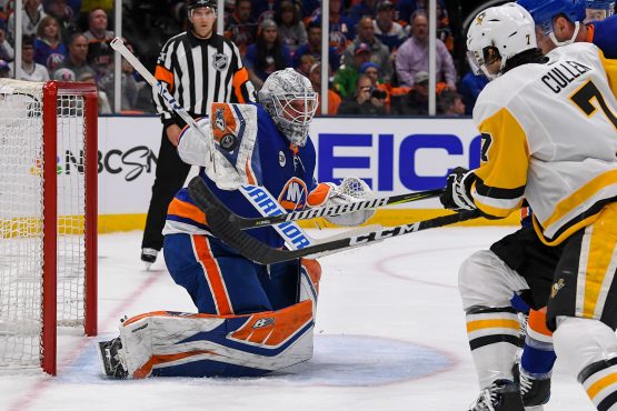 Apr 10, 2019; Brooklyn, NY, USA; New York Islanders goaltender Robin Lehner (40) makes a save against the Pittsburgh Penguins during the first period in game one of the first round of the 2019 Stanley Cup Playoffs at Barclays Center. Mandatory Credit: Dennis Schneidler-USA TODAY Sports