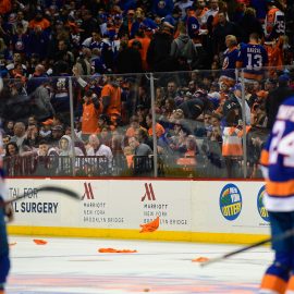 Apr 26, 2019; Brooklyn, NY, USA; Fans throw rally shirts onto the ice after the New York Islanders lose 0-1 to the Carolina Hurricanes in overtime in game one of the second round of the 2019 Stanley Cup Playoffs at Barclays Center. Mandatory Credit: Catalina Fragoso-USA TODAY Sports