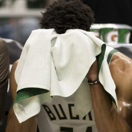 Giannis with towel over head