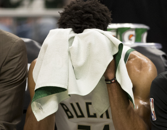 Giannis with towel over head