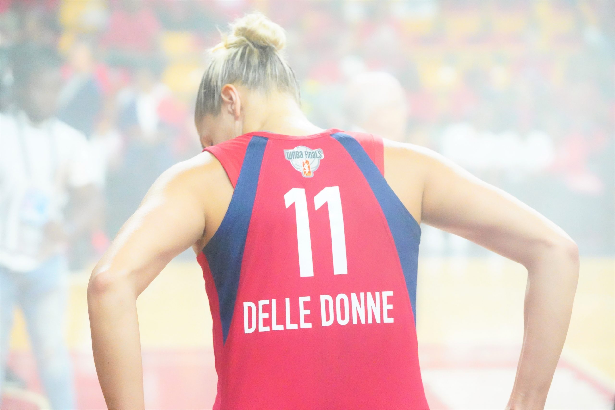 Elena Delle Donne back hands on hips