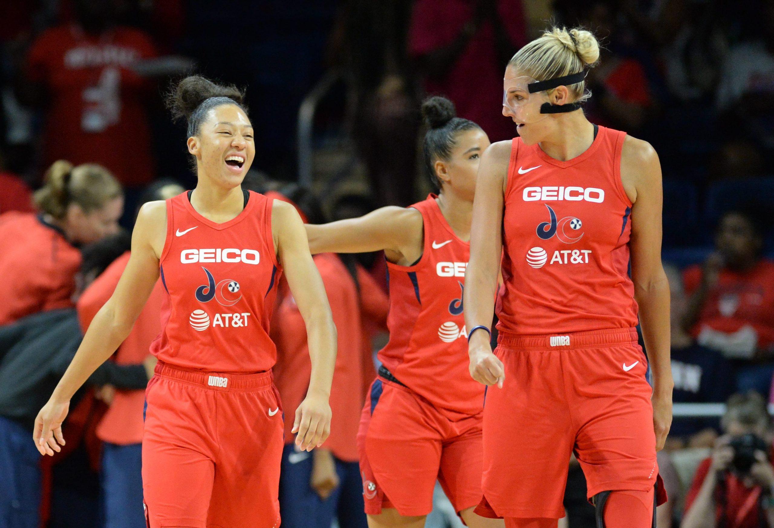 Aerial Powers smiling laughing with Elena Delle Donne