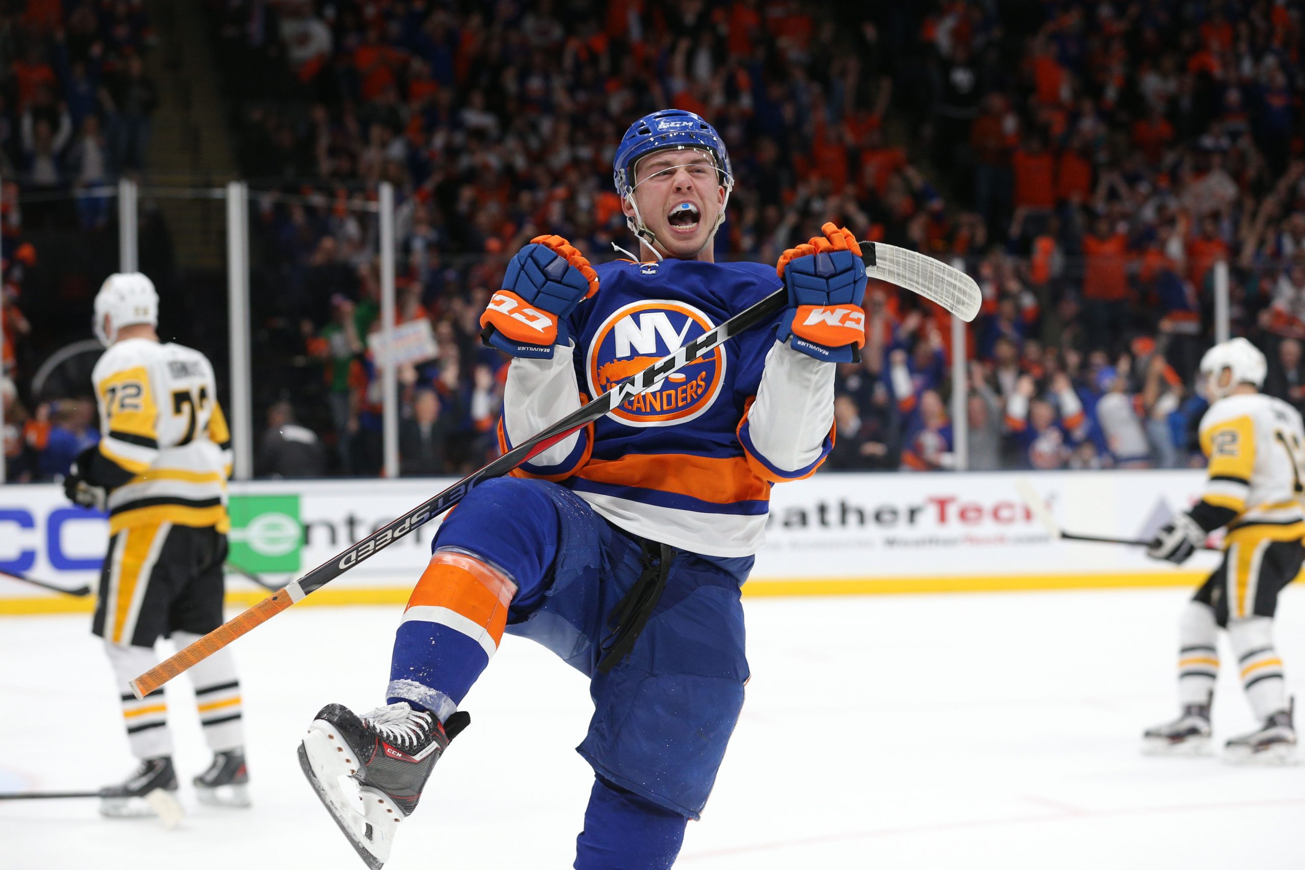 Apr 12, 2019; Uniondale, NY, USA; New York Islanders left wing Anthony Beauvillier (18) celebrates his goal against the Pittsburgh Penguins during the second period of game two of the first round of the 2019 Stanley Cup Playoffs at Nassau Veterans Memorial Coliseum. Mandatory Credit: Brad Penner-USA TODAY Sports