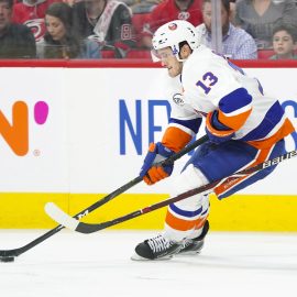 May 3, 2019; Raleigh, NC, USA; New York Islanders center Mathew Barzal (13) skates with the puck against the Carolina Hurricanes in game four of the second round of the 2019 Stanley Cup Playoffs at PNC Arena. The Carolina Hurricanes defeated the New York Islanders 5-2. Mandatory Credit: James Guillory-USA TODAY Sports