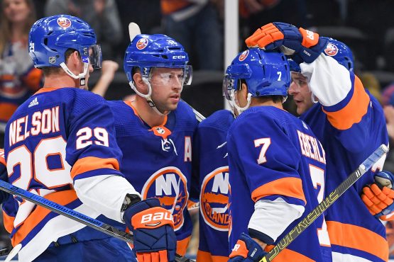 Oct 6, 2019; Brooklyn, NY, USA; New York Islanders celebrate the goal by left wing Anders Lee (27) against the Winnipeg Jets during the second period at Nassau Veterans Memorial Coliseum. Mandatory Credit: Dennis Schneidler-USA TODAY Sports