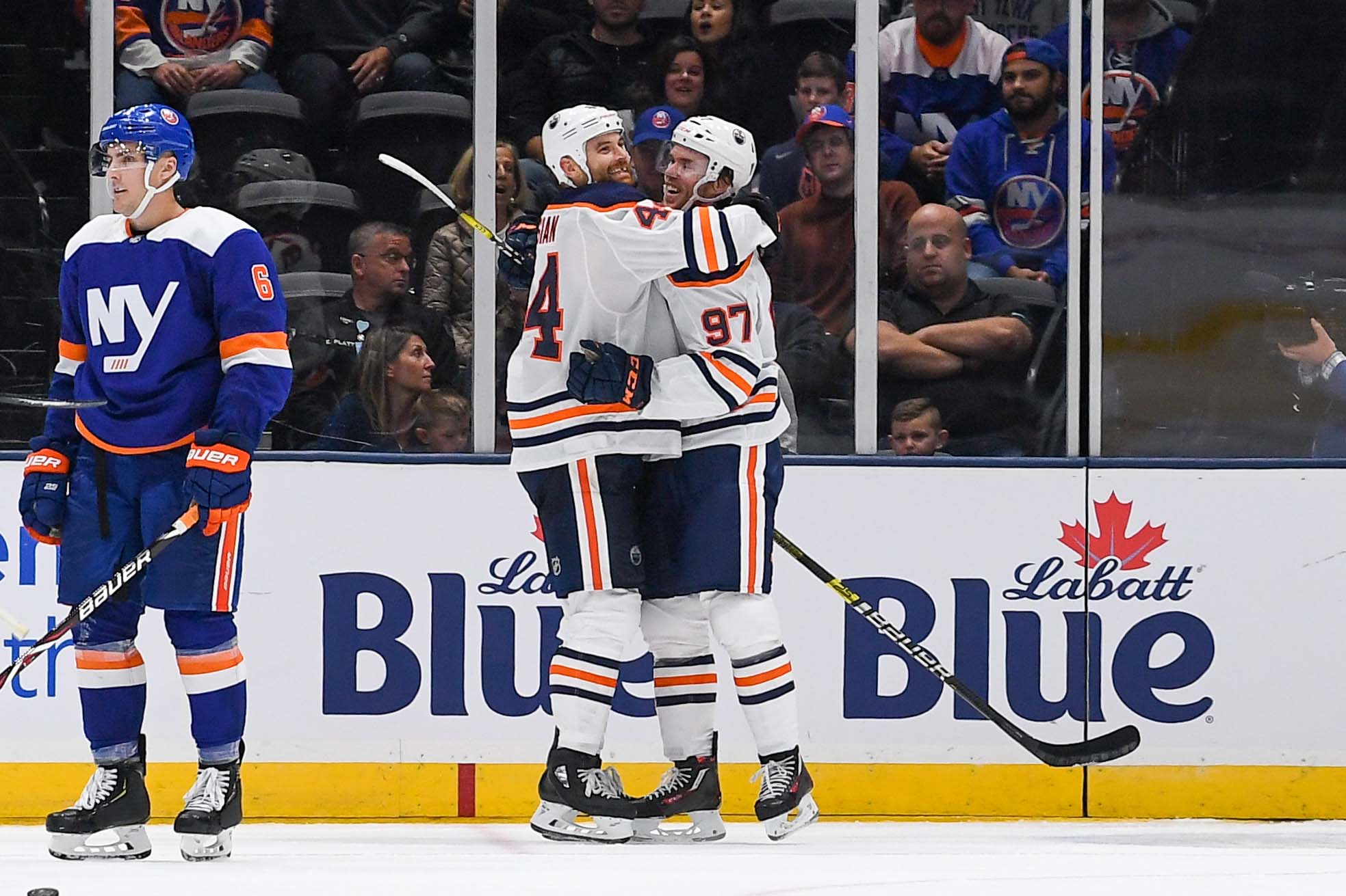 Oct 8, 2019; Uniondale, NY, USA; Edmonton Oilers right wing Zack Kassian (44) celebrates his goal with Edmonton Oilers center Connor McDavid (97) against the New York Islanders during the second period at Nassau Veterans Memorial Coliseum. Mandatory Credit: Dennis Schneidler-USA TODAY Sports
