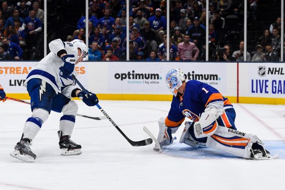Nov 1, 2019; Uniondale, NY, USA; New York Islanders goaltender Thomas Greiss (1) makes a save on Tampa Bay Lightning left wing Ondrej Palat (18) during the first period at Nassau Veterans Memorial Coliseum. Mandatory Credit: Dennis Schneidler-USA TODAY Sports