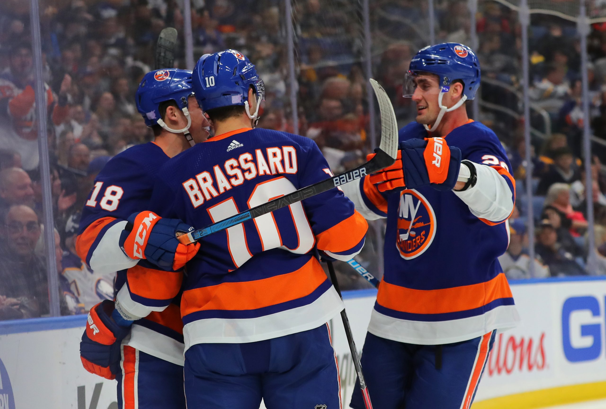 Nov 2, 2019; Buffalo, NY, USA; New York Islanders center Derick Brassard (10) celebrates with teammates after scoring a goal during the first period against the Buffalo Sabres at KeyBank Center. Mandatory Credit: Timothy T. Ludwig-USA TODAY Sports