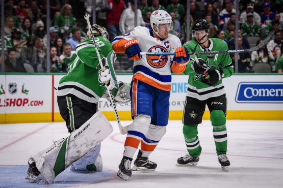 Dec 7, 2019; Dallas, TX, USA; Dallas Stars goaltender Ben Bishop (30) and defenseman John Klingberg (3) defend against New York Islanders left wing Anders Lee (27) during the game at the American Airlines Center. Mandatory Credit: Jerome Miron-USA TODAY Sports