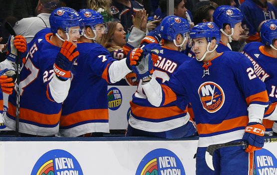 Dec 14, 2019; Uniondale, NY, USA; New York Islanders left wing Michael Dal Colle (28) celebrates with teammates after scoring a goal against the Buffalo Sabres during the first period at Nassau Veterans Memorial Coliseum. Mandatory Credit: Andy Marlin-USA TODAY Sports