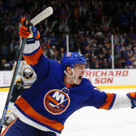 Dec 14, 2019; Uniondale, NY, USA; New York Islanders left wing Anthony Beauvillier (18) celebrates after scoring the game winning goal against the Buffalo Sabres during overtime at Nassau Veterans Memorial Coliseum. Mandatory Credit: Andy Marlin-USA TODAY Sports
