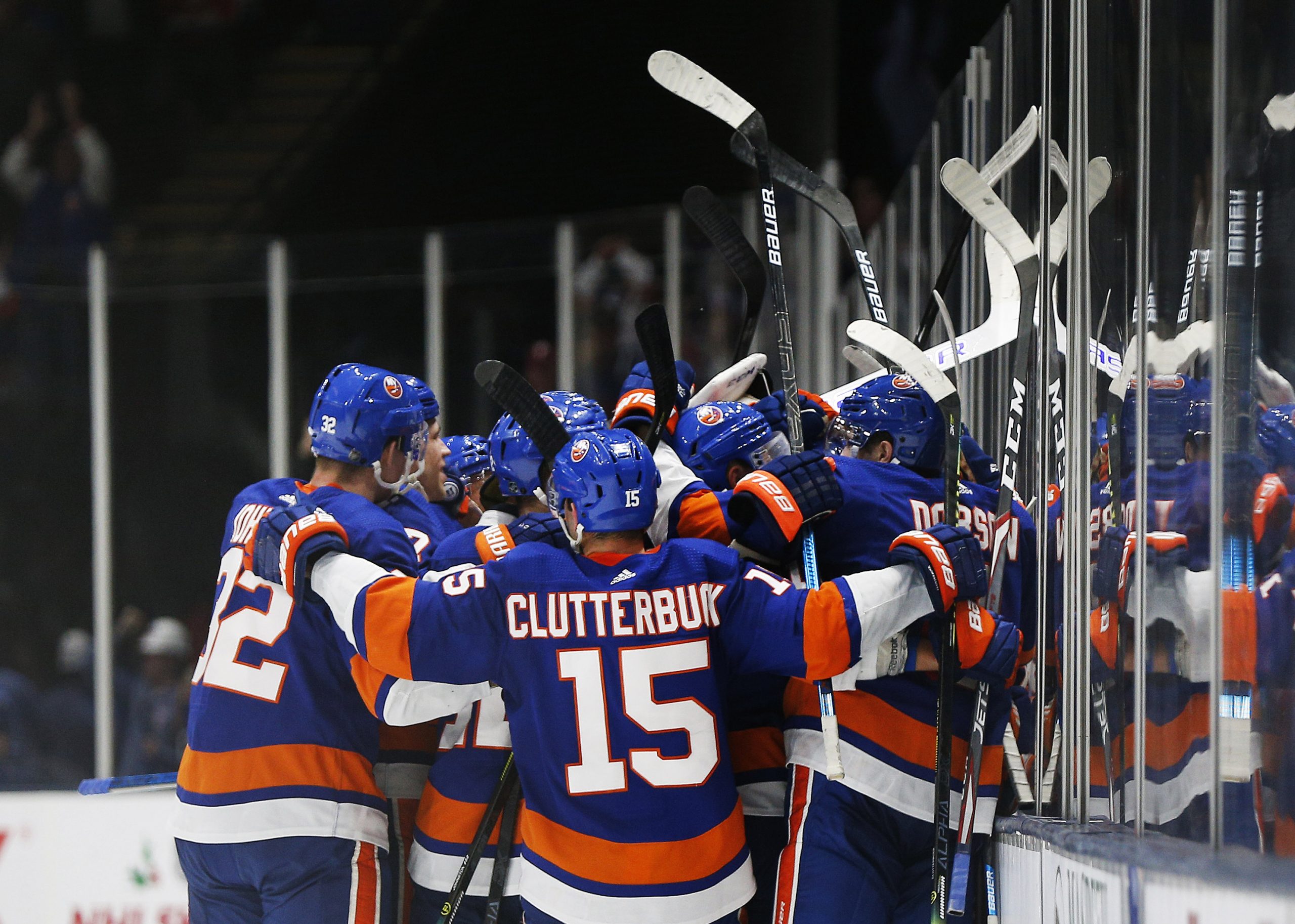 Dec 14, 2019; Uniondale, NY, USA; New York Islanders players celebrate after defeating the Buffalo Sabres at Nassau Veterans Memorial Coliseum. Mandatory Credit: Andy Marlin-USA TODAY Sports
