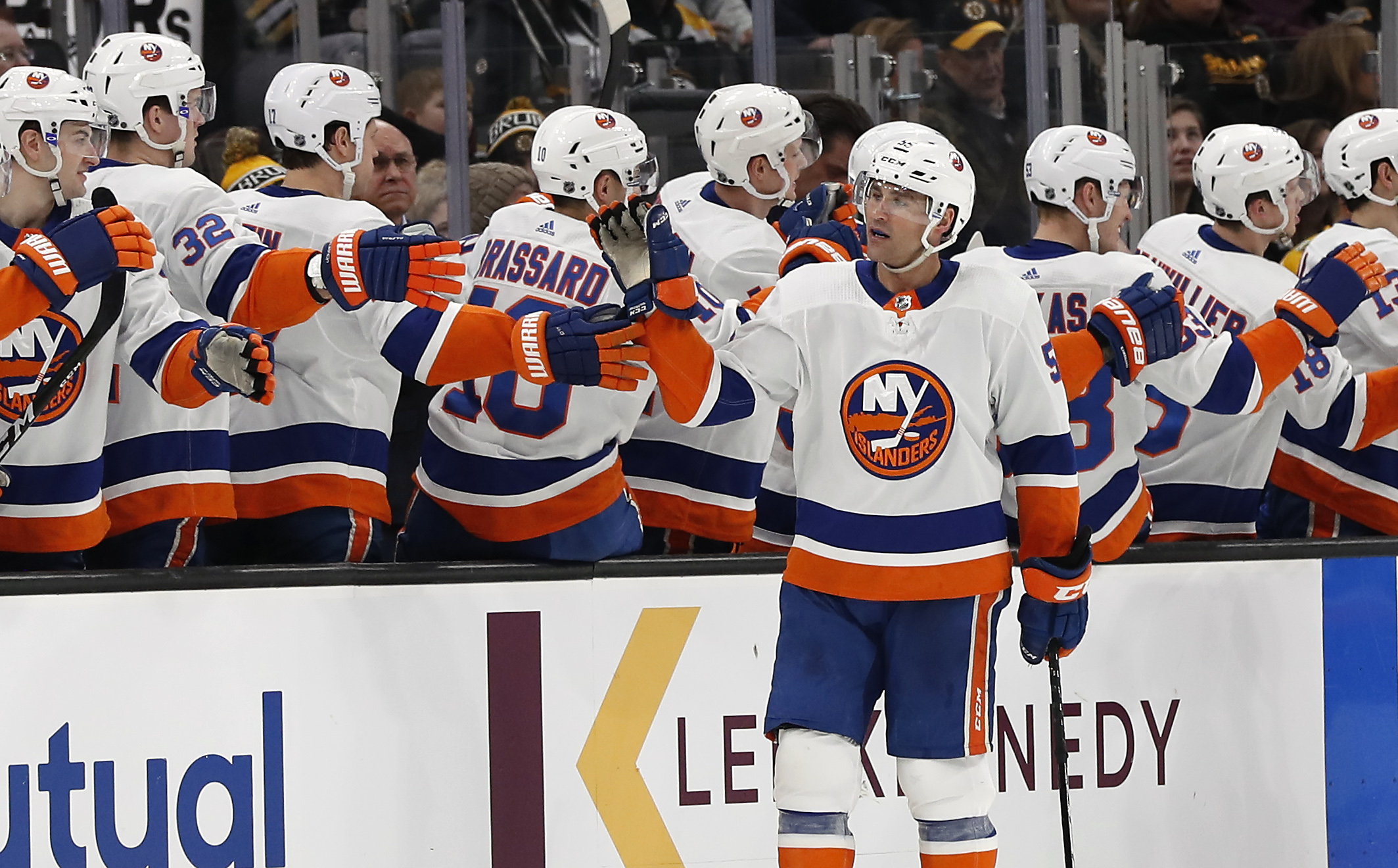 Dec 19, 2019; Boston, MA, USA; New York Islanders defenseman Johnny Boychuk (55) celebrates with teammates on the bench after scoring a goal against the Boston Bruins during the second period at TD Garden. Mandatory Credit: Winslow Townson-USA TODAY Sports