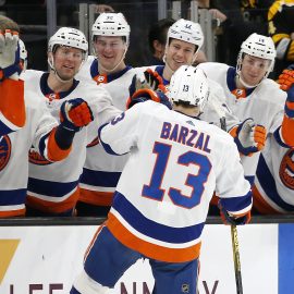 Dec 19, 2019; Boston, MA, USA; New York Islanders center Mathew Barzal (13) celebrates with teammates after scoring a goal against the Boston Bruins during a shootout at TD Garden. Mandatory Credit: Winslow Townson-USA TODAY Sports