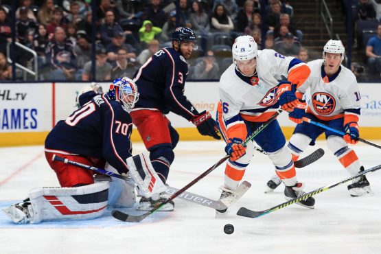 Oct 19, 2019; Columbus, OH, USA; Columbus Blue Jackets goaltender Joonas Korpisalo (70) attempts a save against New York Islanders right wing Oliver Wahlstrom (26) in the third period at Nationwide Arena. Mandatory Credit: Aaron Doster-USA TODAY Sports