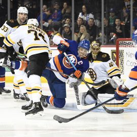 Jan 11, 2020; Brooklyn, New York, USA; New York Islanders center Brock Nelson (29) and left wing Anders Lee (27) attempt a shot on goal against Boston Bruins goaltender Tuukka Rask (40) during the second period at Barclays Center. Mandatory Credit: Sarah Stier-USA TODAY Sports