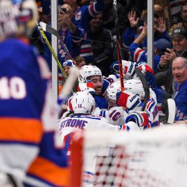 Jan 16, 2020; Uniondale, New York, USA; New York Rangers celebrate after scoring the winning goal against the New York Islanders during the third period at Nassau Veterans Memorial Coliseum. Mandatory Credit: Dennis Schneidler-USA TODAY Sports