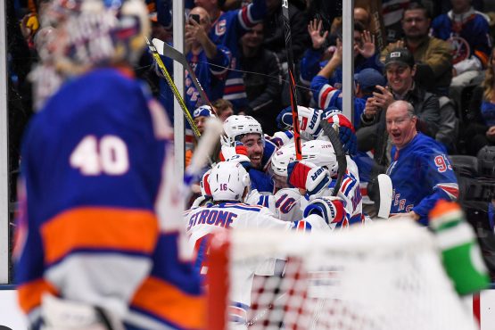 Jan 16, 2020; Uniondale, New York, USA; New York Rangers celebrate after scoring the winning goal against the New York Islanders during the third period at Nassau Veterans Memorial Coliseum. Mandatory Credit: Dennis Schneidler-USA TODAY Sports