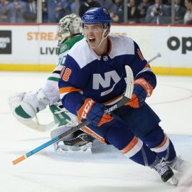 Feb 4, 2020; Brooklyn, New York, USA; New York Islanders left wing Anthony Beauvillier (18) reacts after scoring the game winning goal on a breakaway against Dallas Stars goalie Ben Bishop (30) during overtime at Barclays Center. Mandatory Credit: Brad Penner-USA TODAY Sports