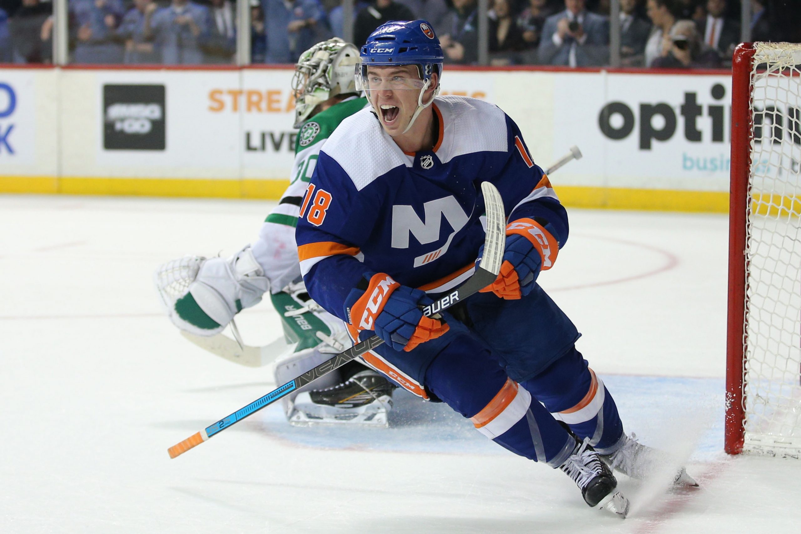 Feb 4, 2020; Brooklyn, New York, USA; New York Islanders left wing Anthony Beauvillier (18) reacts after scoring the game winning goal on a breakaway against Dallas Stars goalie Ben Bishop (30) during overtime at Barclays Center. Mandatory Credit: Brad Penner-USA TODAY Sports