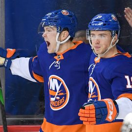 Feb 6, 2020; Brooklyn, New York, USA; New York Islanders left wing Kieffer Bellows (20) celebrates his first NHL goal with New York Islanders left wing Anthony Beauvillier (18) against the Los Angeles Kings during the second period at Barclays Center. Mandatory Credit: Dennis Schneidler-USA TODAY Sports