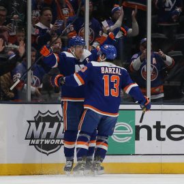 Feb 23, 2020; Uniondale, New York, USA; New York Islanders left wing Anders Lee (27) celebrates his goal against the San Jose Sharks with center Mathew Barzal (13) during the first period at Nassau Veterans Memorial Coliseum. Mandatory Credit: Brad Penner-USA TODAY Sports