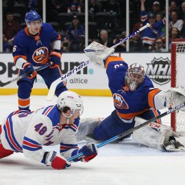 Feb 25, 2020; Uniondale, New York, USA; New York Islanders goalie Semyon Varlamov (40) makes a save on a shot by New York Rangers left wing Brendan Lemieux (48) during the first period at Barclays Center. Mandatory Credit: Brad Penner-USA TODAY Sports