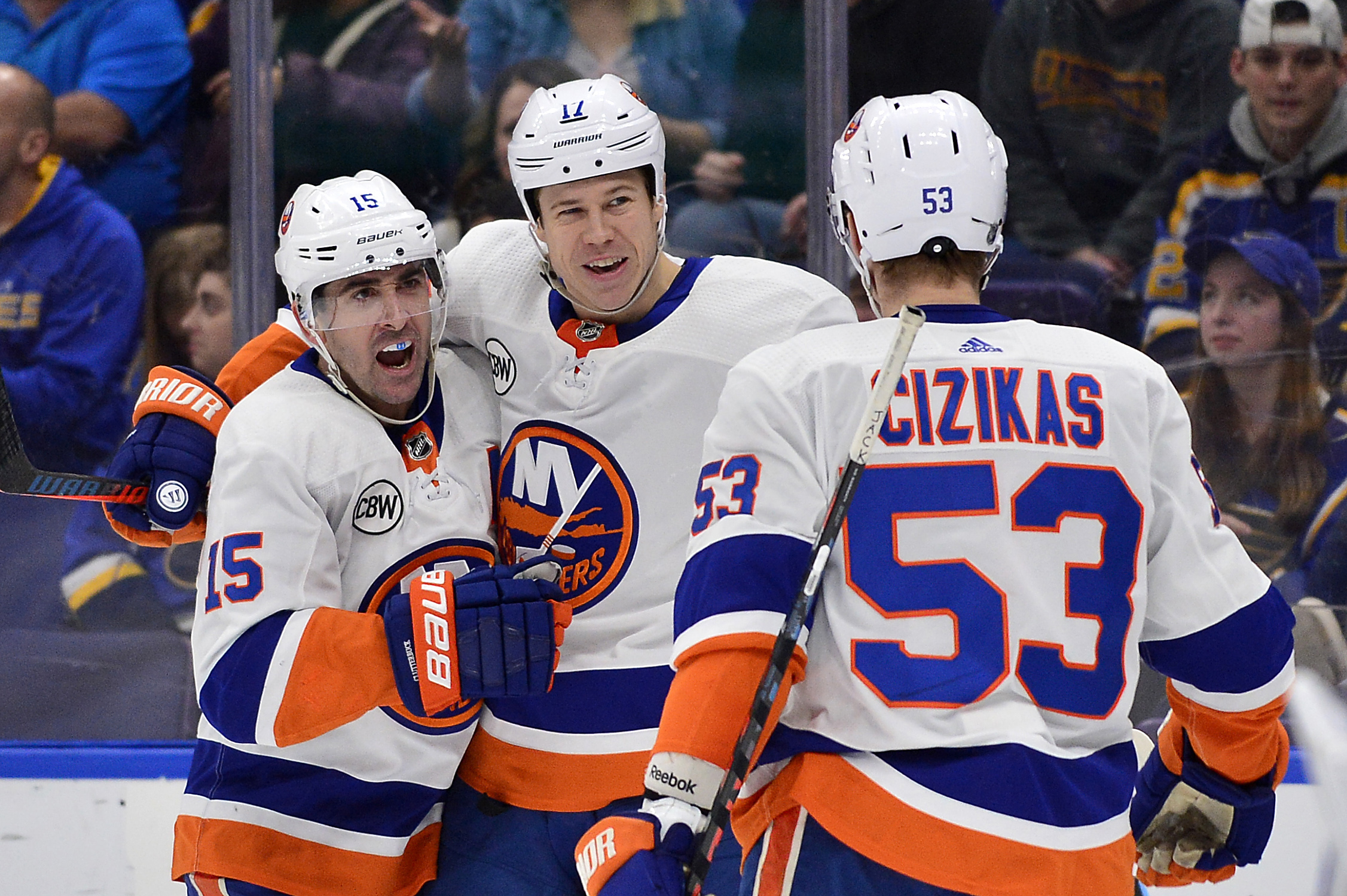 Jan 5, 2019; St. Louis, MO, USA; New York Islanders left wing Matt Martin (17) is congratulated by right wing Cal Clutterbuck (15) and center Casey Cizikas (53) after scoring during the second period against the St. Louis Blues at Enterprise Center. Mandatory Credit: Jeff Curry-USA TODAY Sports