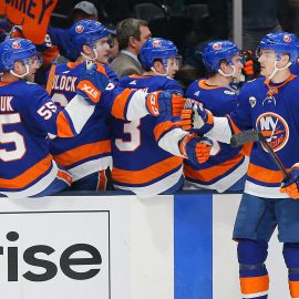 Mar 9, 2019; Uniondale, NY, USA; New York Islanders defenseman Scott Mayfield (24) is congratulated after scoring a goal against the Philadelphia Flyers during the first period at Nassau Veterans Memorial Coliseum. Mandatory Credit: Andy Marlin-USA TODAY Sports