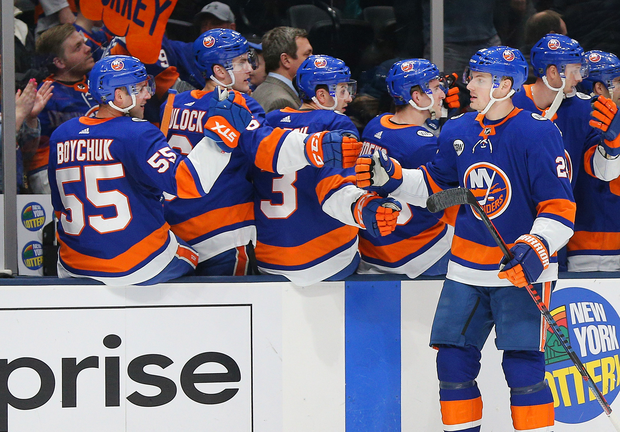 Mar 9, 2019; Uniondale, NY, USA; New York Islanders defenseman Scott Mayfield (24) is congratulated after scoring a goal against the Philadelphia Flyers during the first period at Nassau Veterans Memorial Coliseum. Mandatory Credit: Andy Marlin-USA TODAY Sports