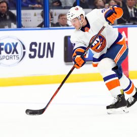 Dec 9, 2019; Tampa, FL, USA;New York Islanders defenseman Scott Mayfield (24) shoots against the Tampa Bay Lightning during the second period at Amalie Arena. Mandatory Credit: Kim Klement-USA TODAY Sports