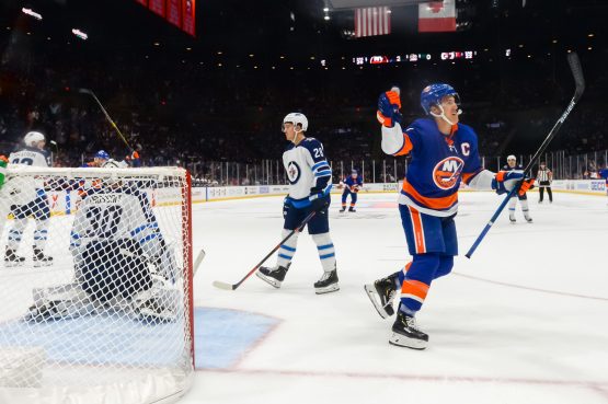 Oct 6, 2019; Brooklyn, NY, USA; New York Islanders left wing Anders Lee (27) celebrates his goal against the Winnipeg Jets during the second period at Nassau Veterans Memorial Coliseum. Mandatory Credit: Dennis Schneidler-USA TODAY Sports