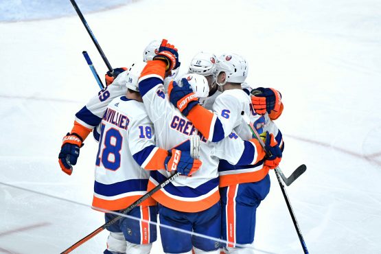 Feb 17, 2020; Glendale, Arizona, USA; New York Islanders left wing Anthony Beauvillier (18) celebrates with teammates after scoring a goal against the Arizona Coyotes in the third period at Gila River Arena. Mandatory Credit: Matt Kartozian-USA TODAY Sports