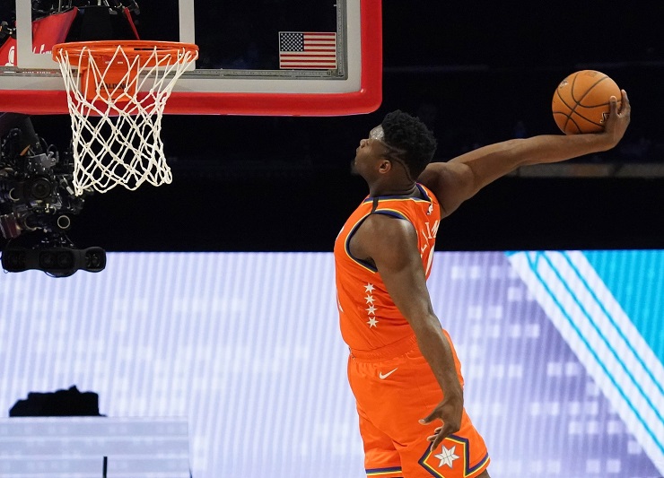 Zion Williamson dunks in the NBA All Star Rising Stars Game